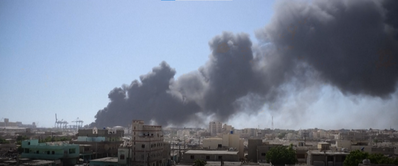 File Photo - Smoke billows after a drone strike on the port of Port Sudan on May 6, 2025.  (AFP)